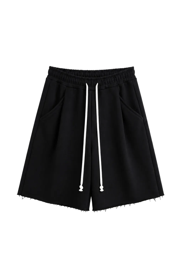 Pantaloni negri oversized cu șnur lung în talie, având o cusătură decorativă frontală pe centrul piciorului, confecționați di