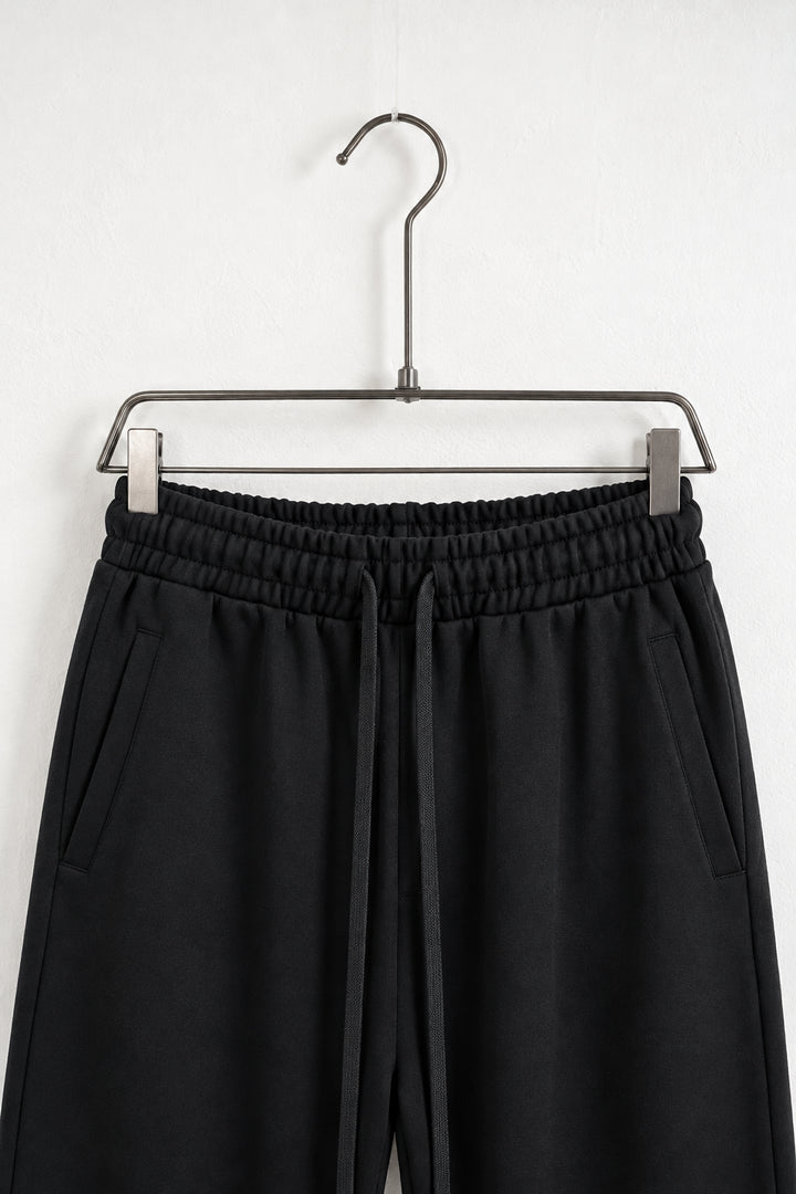 Detaliu talie și buzunare pantaloni jogger 25600