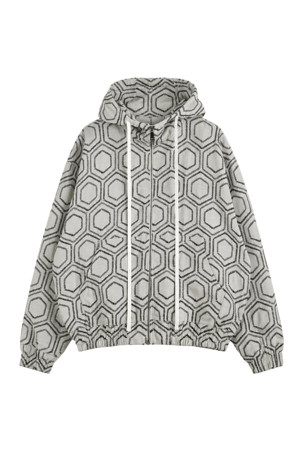 Geacă hoodie albă cu fermoar și model geometric negru repetitiv, fotografiată în studio minimalist pe fundal deschis, stil luxury streetwear.