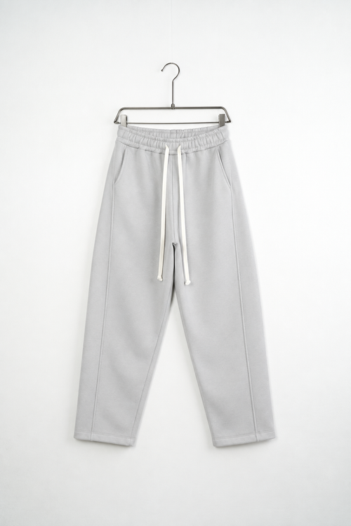 Pantaloni Baggy Felpați Bărbați Gri Gheață, vedere frontală pe umeraș, fundal deschis