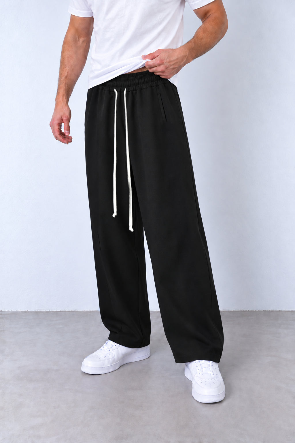 Pantaloni baggy negri 202501-INV din trei sferturi, buzunar și cusătură laterală