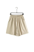 Pantaloni scurți crem cu șnur lung și croială minimalistă, talie ajustabilă