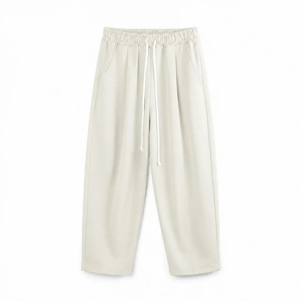 Pantaloni bej deschis cu croială largă pentru bărbați, vedere din spate cu buzunar