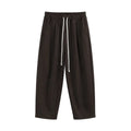 Pantaloni lungi maro cu croială largă pentru bărbați, vedere din față cu șnur ajustabil