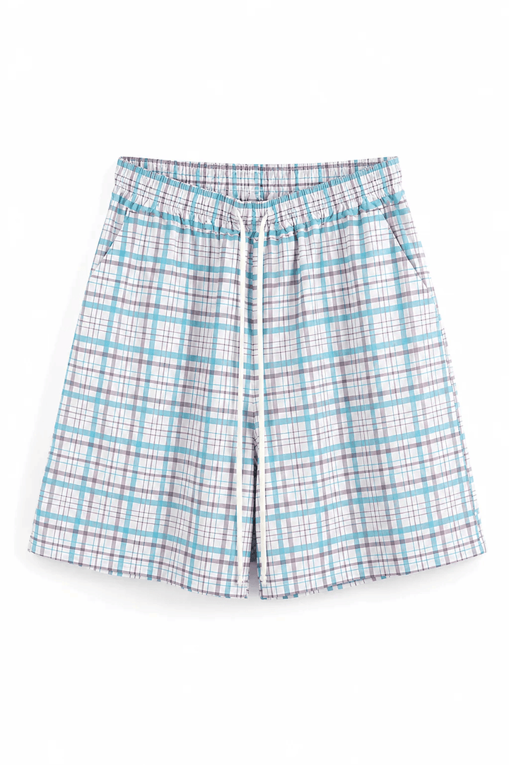 Pantaloni streetwear lejeri din 100% poliester, cu un imprimeu geometric dens format din pătrățele albastre și linii gri.