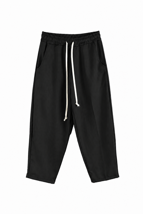 Pantaloni gri wide leg oversized cu șnur lung alb, fit baggy premium streetwear, material heavyweight și design minimalist luxury.