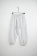 Pantaloni Jogger Balloon Fit Bărbați Gri Melanj, vedere frontală pe umeraș, fundal deschis