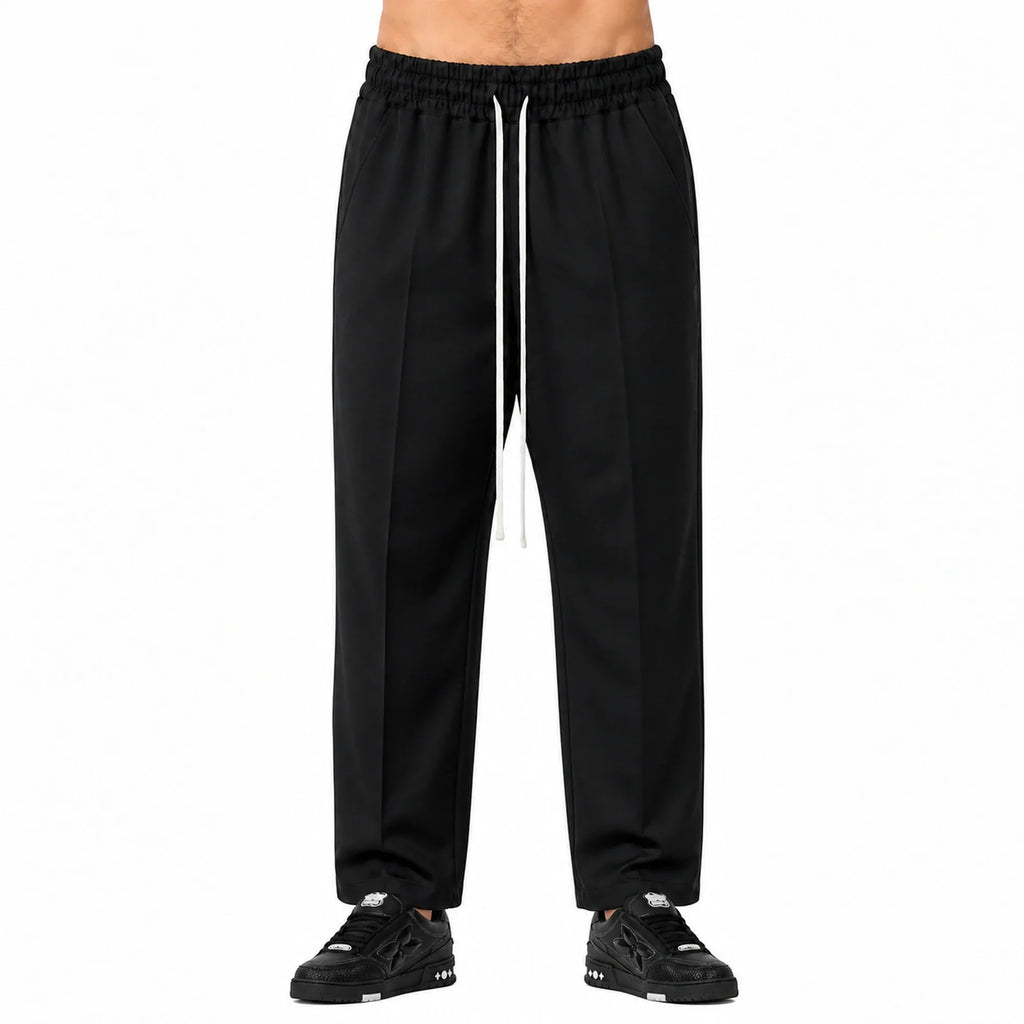Pantaloni cu croială largă bărbați negri, purtați de model, vedere frontală
