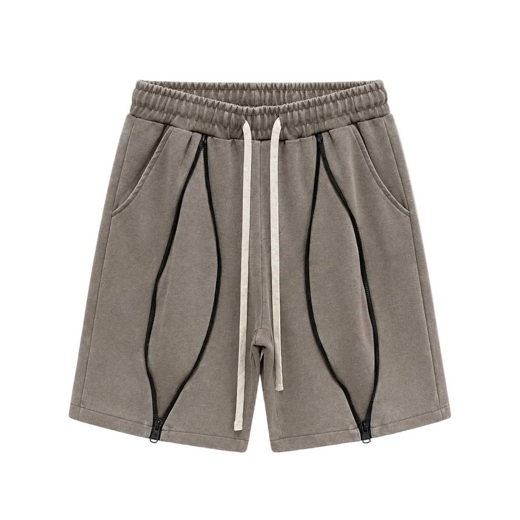 Pantaloni maro cu șnur lung și fermoare pe mijloc, design urban modern.
