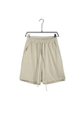 Pantaloni scurți unisex din bumbac moale, culoare crem, model versatil cu șiret lung în talie pentru un look relaxat