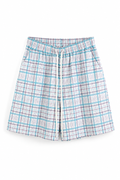 Pantaloni streetwear lejeri din 100% poliester, cu un imprimeu geometric dens format din pătrățele albastre și linii gri.