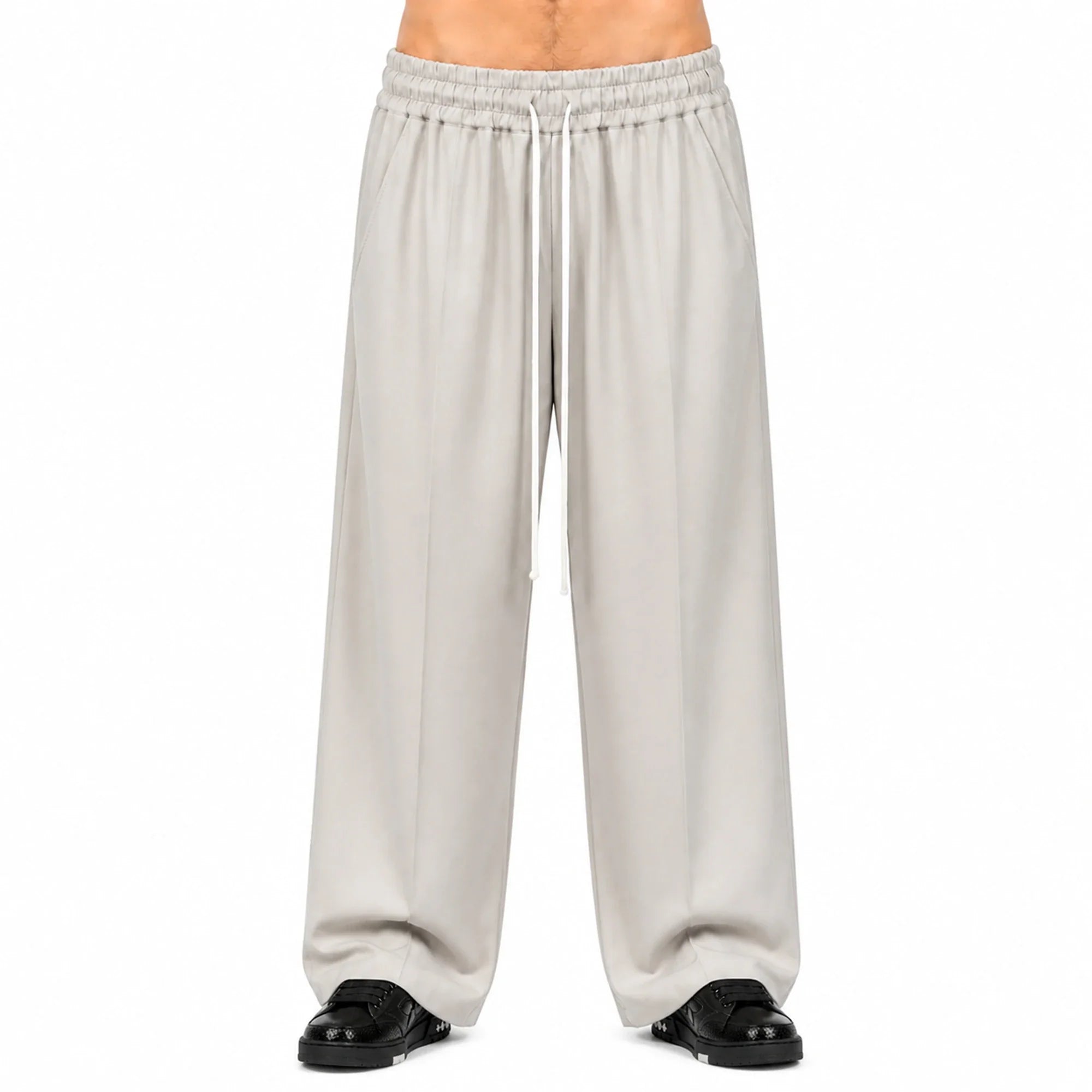 Pantaloni wide leg bărbați bej, purtați de model, vedere frontală